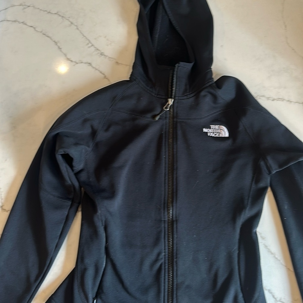 North face Jacket. Great for skiing or out and about in cold weather.